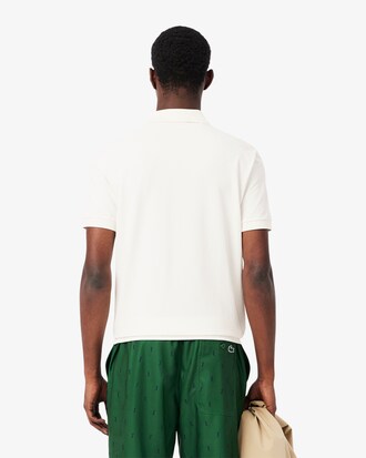 Polo de golf de mini piqué de corte holgado