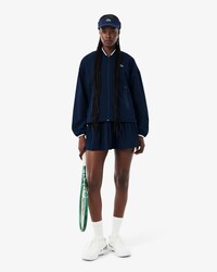 Chaqueta de ch&aacute;ndal de tenis hidr&oacute;fuga