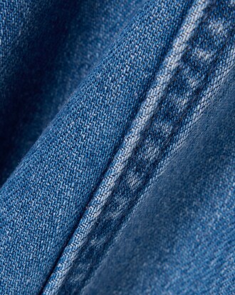 Pantal&oacute;n vaquero el&aacute;stico de corte acampanado