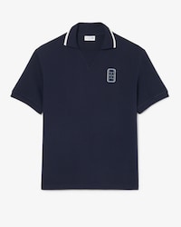 Polo de piqu&eacute; con insignia bordada de corte amplio
