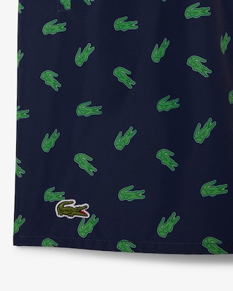 Short de ba&ntilde;o de largo medio con estampado de cocodrilos