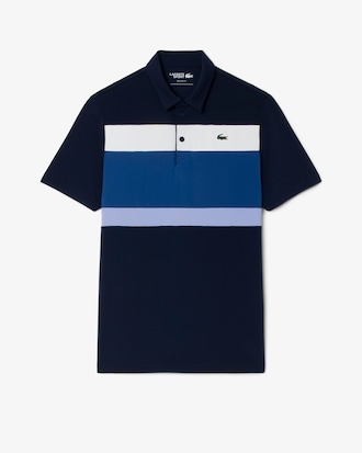 Polo de golf de corte regular con bloques de color
