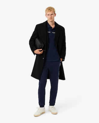 Pantal&oacute;n de ch&aacute;ndal con ribete de logotipo