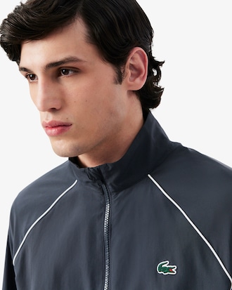 Chaqueta de ch&aacute;ndal deportiva hidr&oacute;fuga con ribete en contraste