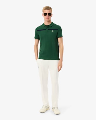Polo de tenis clásico con insignia decorativa Ultra Dry