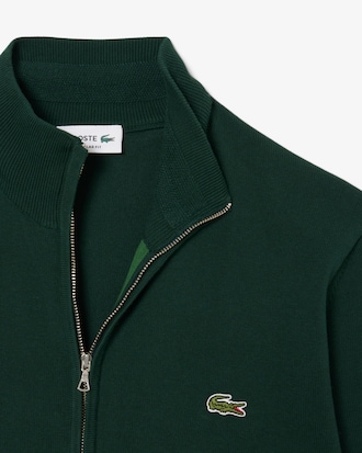 Pull zippé coton uni col montant