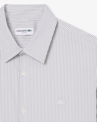 Chemise slim fit popeline stretch ray&eacute;e