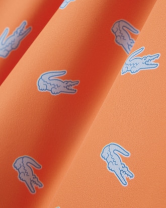 Short de bain mi-long imprim&eacute; crocodile