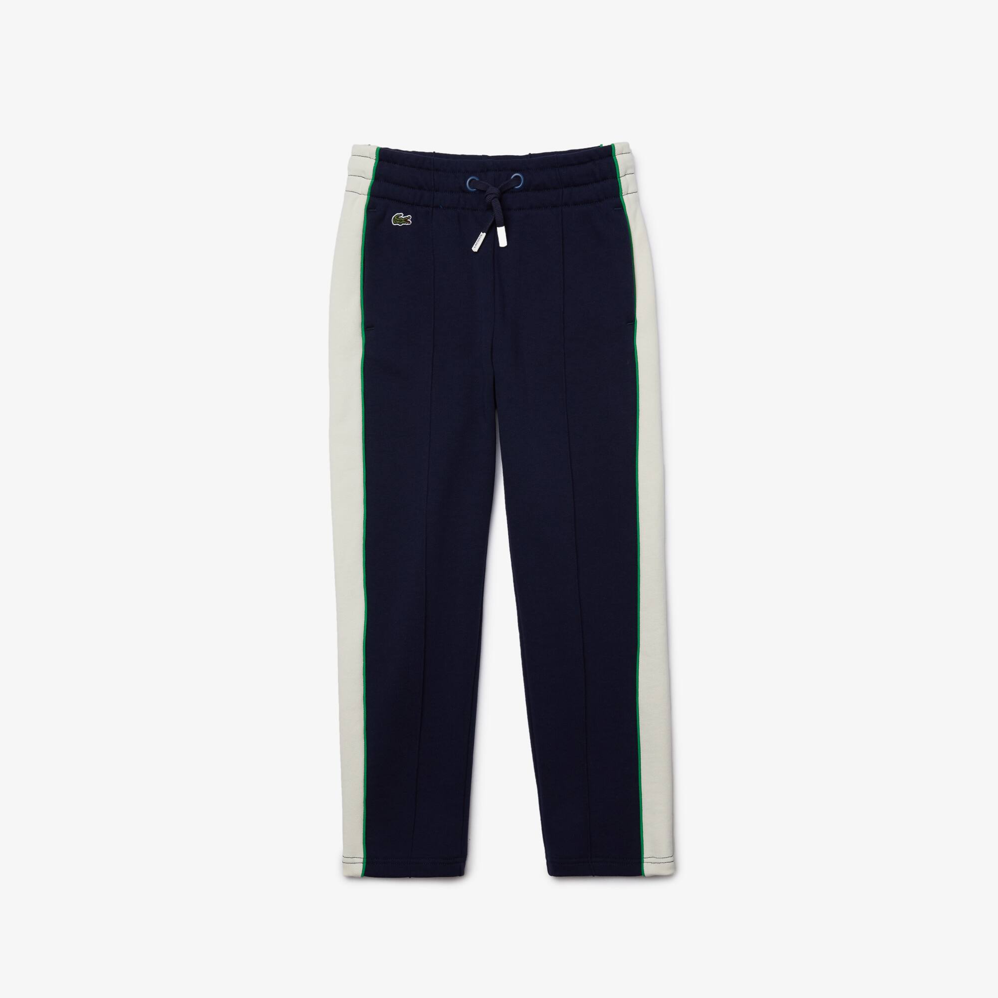 Lacoste Pantalon de jogging Garçon en molleton de coton color-block Taille 8 ans Bleu Marine / Blanc