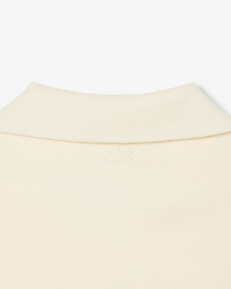 Polo loose fit molleton avec badge