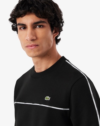 Sweatshirt molleton liserés griffés