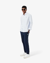 Pantalon de surv&ecirc;tement bandes griff&eacute;es
