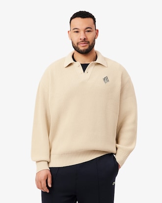 Pull col polo maille perl&eacute;e badge