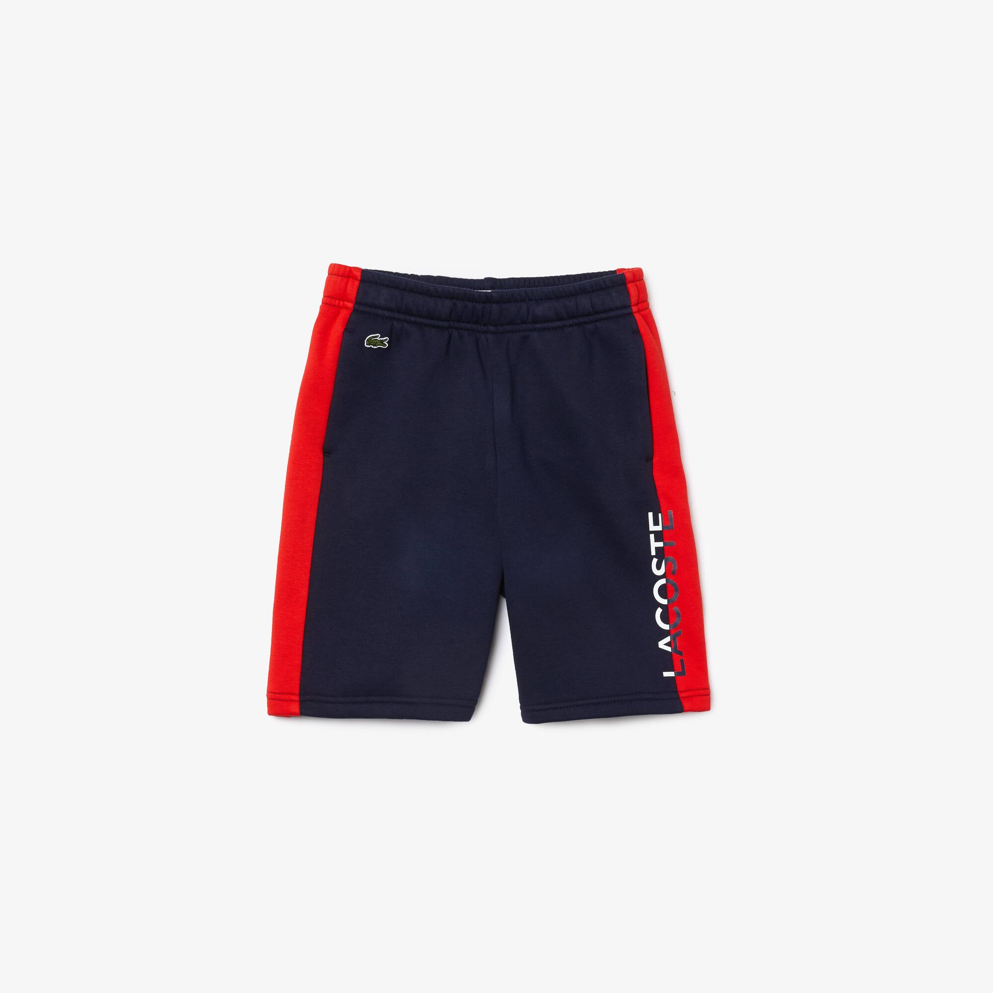 Lacoste Short Garçon en molleton bicolore avec marquage Taille 14 ans Bleu Marine / Rouge