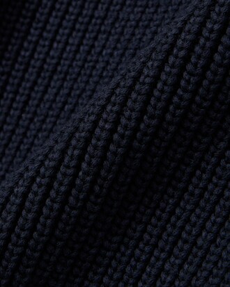 Pull col polo maille perl&eacute;e badge