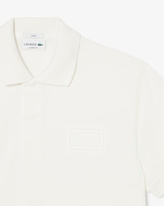 Polo classic fit marquage emboss&eacute;