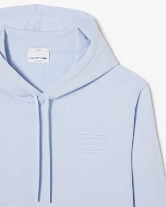 Sweatshirt &agrave; capuche marquage emboss&eacute;