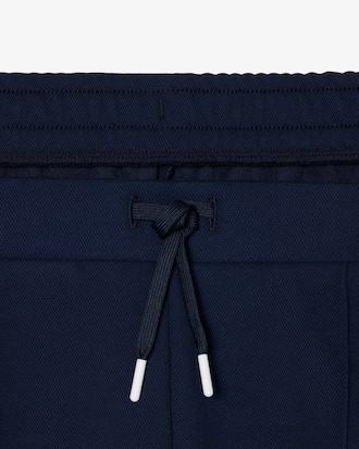 Short Tennis H&eacute;ritage Ultra Dry badge