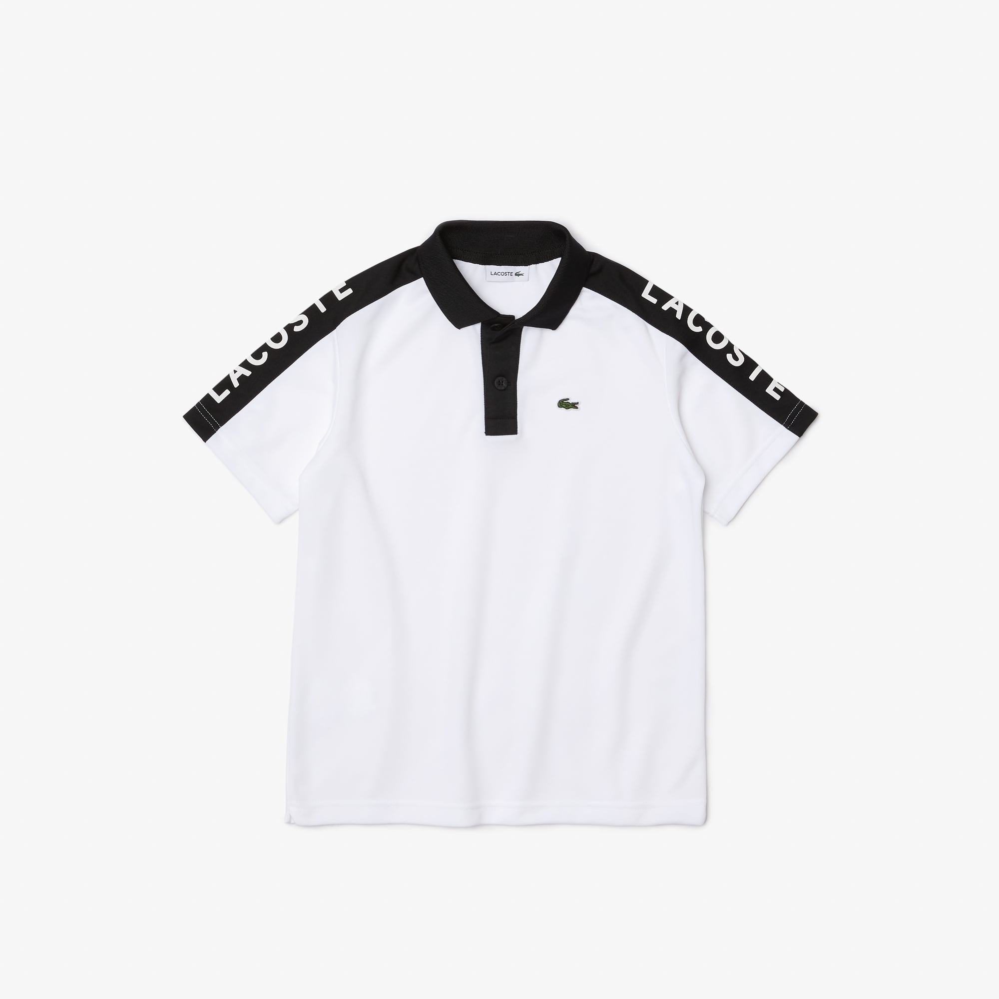 Lacoste Polo Garcon Lacoste en pique respirant avec bandes siglees