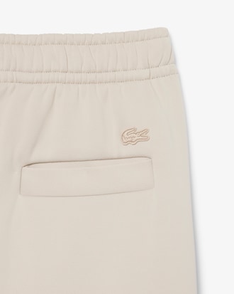 Pantalon de surv&ecirc;tement satin&eacute; D&eacute;fil&eacute;