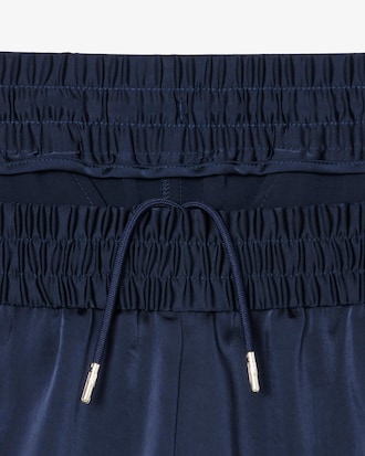 Pantalon fluide à poches zippées