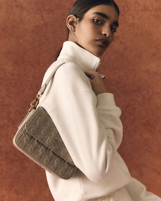 Maheki Embossed Leather Shoulder Bag