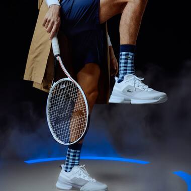 AG-LT21 Ultra tennis trainers in white and green woven mesh.