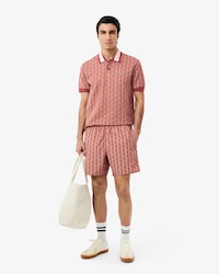 Mid Length Monogram Print Swim Trunks