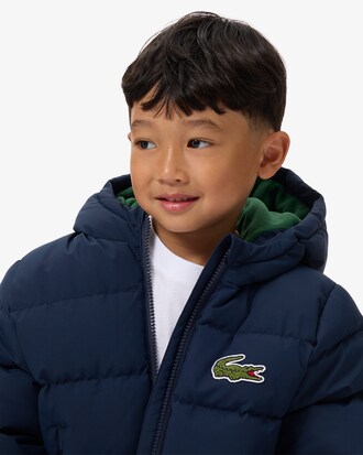 Unisex Puffer-Jacke mit Kapuze und gesticktem Krokodil