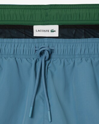 Halblange, einfarbige Badehose