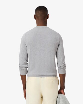 Einfarbiger Pullover aus Baumwolle mit V-Ausschnitt