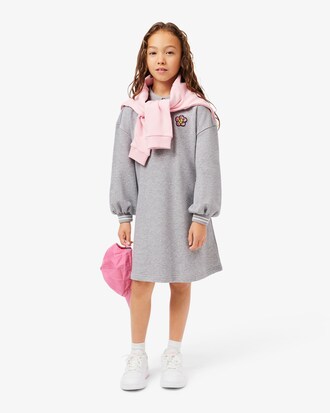 Kleid aus Fleece mit Blumen-Badge