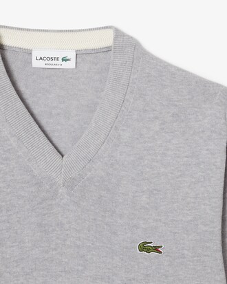 Einfarbiger Pullover aus Baumwolle mit V-Ausschnitt