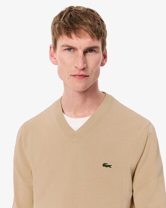 Einfarbiger Pullover aus Baumwolle mit V-Ausschnitt