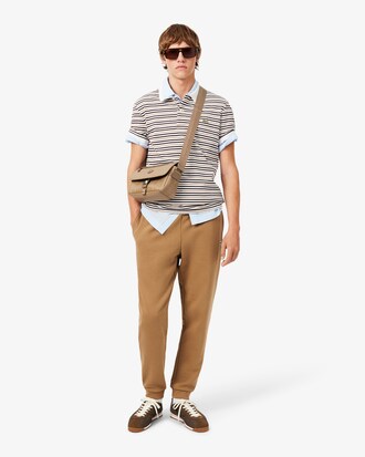 Kleine Umh&auml;ngetasche aus Leder mit &Uuml;berschlag und Monogramm