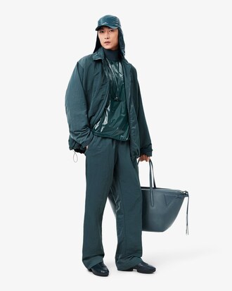 Runway Loose Fit gl&auml;nzende Jogginghose