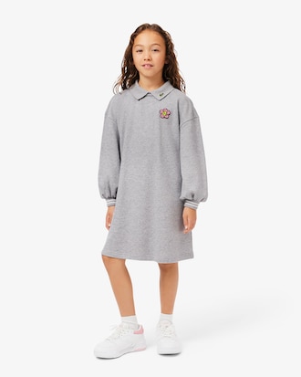 Kleid aus Fleece mit Blumen-Badge