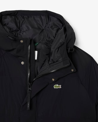 Lange, wasserabweisende Daunenjacke