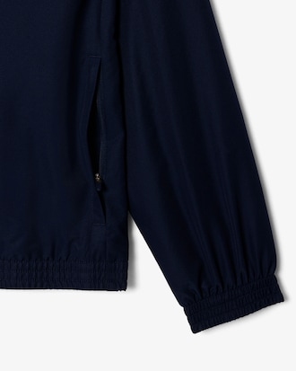 Wasserabweisende Tennisjacke mit Kapuze