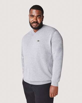 Einfarbiger Pullover aus Baumwolle mit V-Ausschnitt