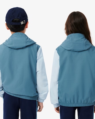 Wasserabweisende Jacke mit Kapuze und Reißverschluss
