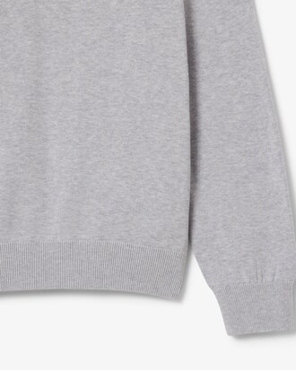 Einfarbiger Pullover aus Baumwolle mit V-Ausschnitt