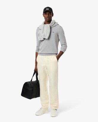 Einfarbiger Pullover aus Baumwolle mit V-Ausschnitt