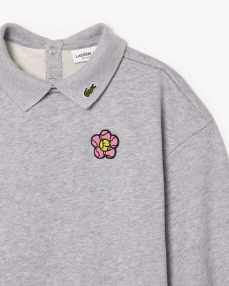 Kleid aus Fleece mit Blumen-Badge