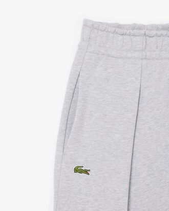 Weite Hose mit Falten und Krokodil