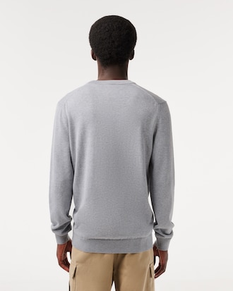 Einfarbiger Pullover aus Baumwolle mit V-Ausschnitt