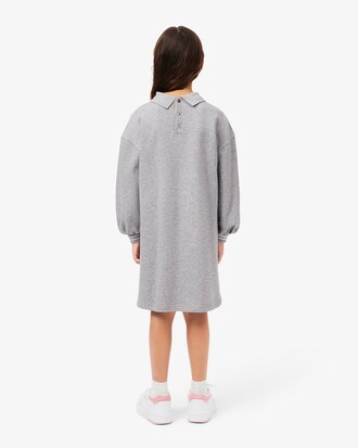 Kleid aus Fleece mit Blumen-Badge