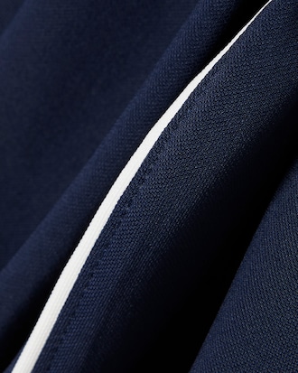Polohemd Heritage mit Badge und Ultra Dry-Technologie