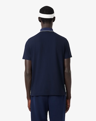 Polohemd Heritage mit Badge und Ultra Dry-Technologie