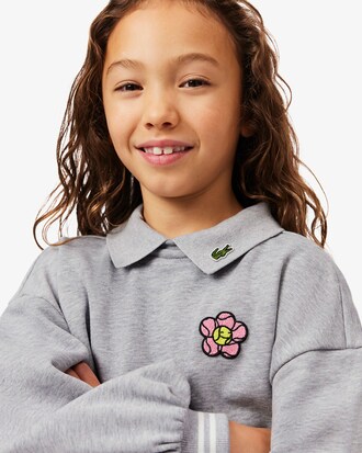 Kleid aus Fleece mit Blumen-Badge